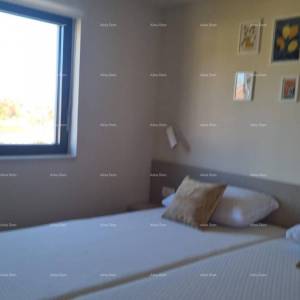 Moderan apartman u bloku E s parkirnim mjestom i spremištem, u blizini Umaga!