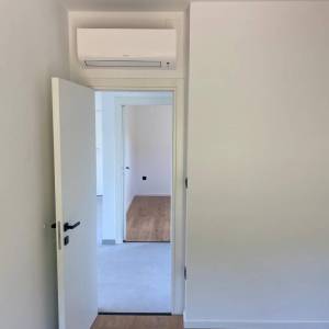 BAŠKA okolica - Dvosobni apartman s dva parkina mjesta, novogradnja