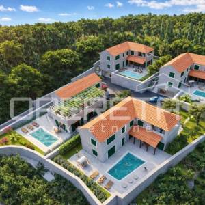 Građevinsko zemljište s idejnim za 4 kuće, Čilipi