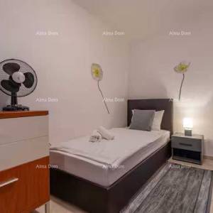 Izvrsna prilika! Prodaja - atraktivna dvojna kuća s bazenom i uređenom okućnicom, Banjole!