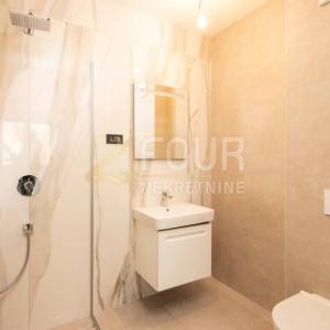 Lovran, novogradnja, 77.17m2, 2s+db, terasa, okućnica, pogled na more