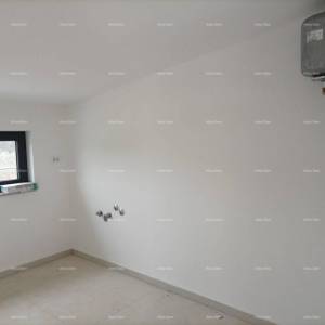 Moderna vila za odmor u zatvorenom kompleksu sa vilama na samoj obali mora.