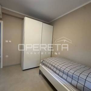 Penthouse u Okrugu Gornjem s krovnom terasom i pogledom na more