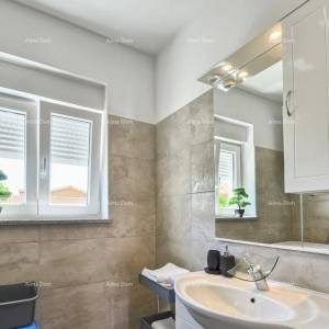 Prodaja dvoetažnog stana s velikom vrtom i garažom, Ližnjan!