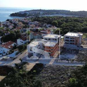 Dvosoban stan, novogradnja, Pješčana uvala - 400m od plaže