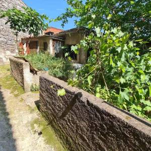 Kuća u centru Marčane s vrtom.