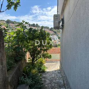 ISTRA, RABAC  Etaža kuće s pogledom na more na pješačkoj udaljenosti od mora s garažom!