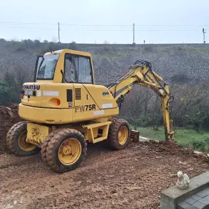 KOMATSU PW 75 R na kotače