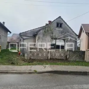 Kuća s okućnicom i dodatnim objektom u mirnom Donjem Kućanu
