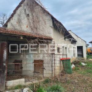 Kuća s okućnicom i dodatnim objektom u mirnom Donjem Kućanu