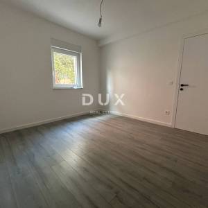 ŠIBENIK, VODICE – Stan u prizemlju sa 121 m² vrta, 2 parkinga, novogradnja