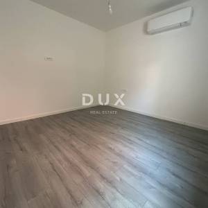 ŠIBENIK, VODICE – Stan u prizemlju sa 121 m² vrta, 2 parkinga, novogradnja