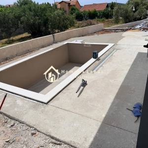 Tribunj,novi 3-soban stan 114,20m2(252m2 velikim vrtom i bazenom,2PM)