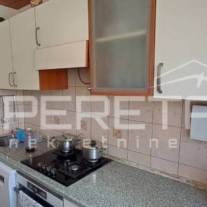 Velika kuća s vrtom, garažom i potkrovljem za dodatni stan