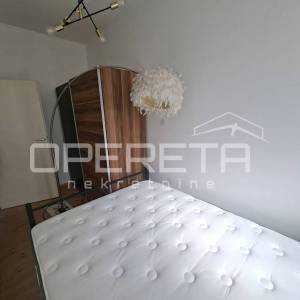 Eksluzivan najam - moderno uređen stan (38m2 stan + 12 m2 predsoblje/zimski vrt)