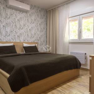 Hrvatska, Zadar, Vir - luksuzna vila s 3 apartmana i garažom, velikim parkingom i dvorištem,  191.32 m2, 30 m do plaže