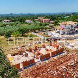 
Iatra, Poreč okolica – moderna dvojna kuće s bazenom i pogledom na more


