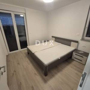 ISTRA,MEDULIN - Stan u prizemlju s bazenom i vrtom u novogradnji s dva parkirna mjesta,namješten