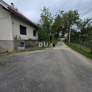 OGULIN, TOUNJ - samostojeća kuća s 2 pomoćna objekta odmah do rijeke + okućnica 5000m2