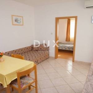 OTOK PAG, PAG - Kuća s 5 apartmana i uhodanim turističkim poslovanjem, 511m2