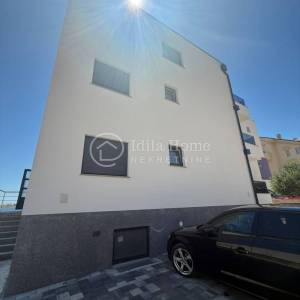 PAG/POVLJANA/NOVOGRADNJA/MODERAN DVOSOBNI APARTMAN 65 M2 SA TERASOM I PARKINGOM/PRILIKA!