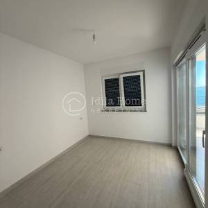 PAG/POVLJANA/NOVOGRADNJA/MODERAN DVOSOBNI APARTMAN 65 M2 SA TERASOM I PARKINGOM/PRILIKA!