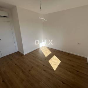 ŠIBENIK, TRIBUNJ – Stan s pogledom na more u novogradnji! PRILIKA!