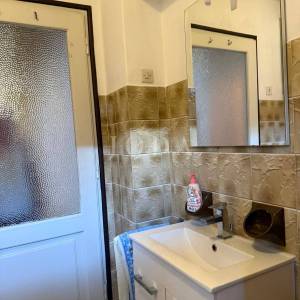 Stan na prvom katu kuće s velikim vrtom – Lovran