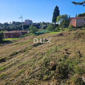 ISTRA, LABIN - Zemljište s dozvolom za gradnju i pogledom na more – projekt za 4 stana