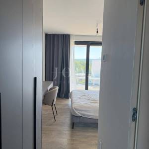 MALINSKA – Moderna vila s bazenom u pripremi, saunom, teretanom i panoramskom krovnom terasom