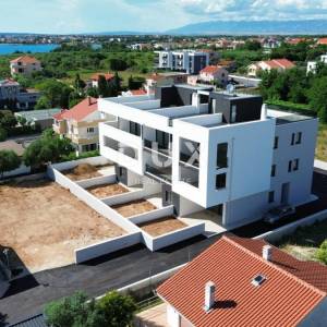 ZADAR, PRIVLAKA - Ekskluzivna Prilika za Luksuzan Život Uz Plažu u Modernoj Novogradnji! S3