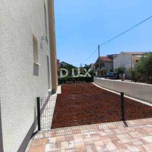 ZADAR, SUKOŠAN - trosobni stan sa vrtom u  novogradnji