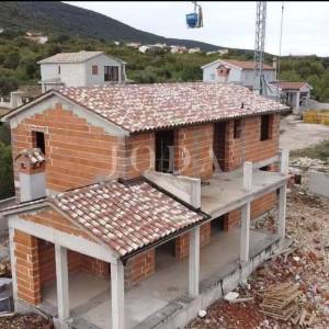 Labin, okolica, kuća u izgradnji s pogledom na more