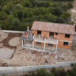 Labin, okolica, kuća u izgradnji s pogledom na more
