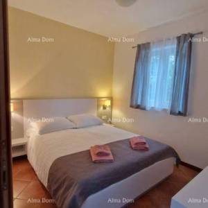 MEDULIN, POŠESI, STAN 73,54 m² S VRTOM, 150 m OD MORA