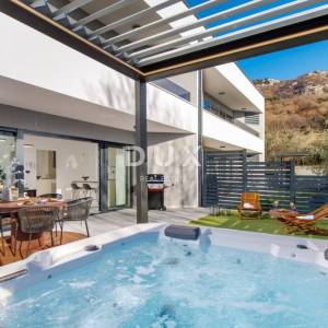 Krk, Draga Bašćanska, dvosobni stan 62 m2, vrt, jacuzzi, najam