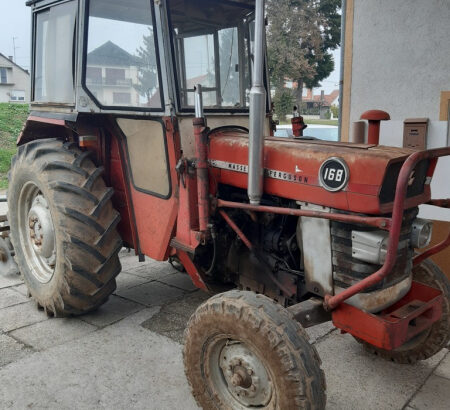 Traktor MF 168 sa prednjim utovarivačem